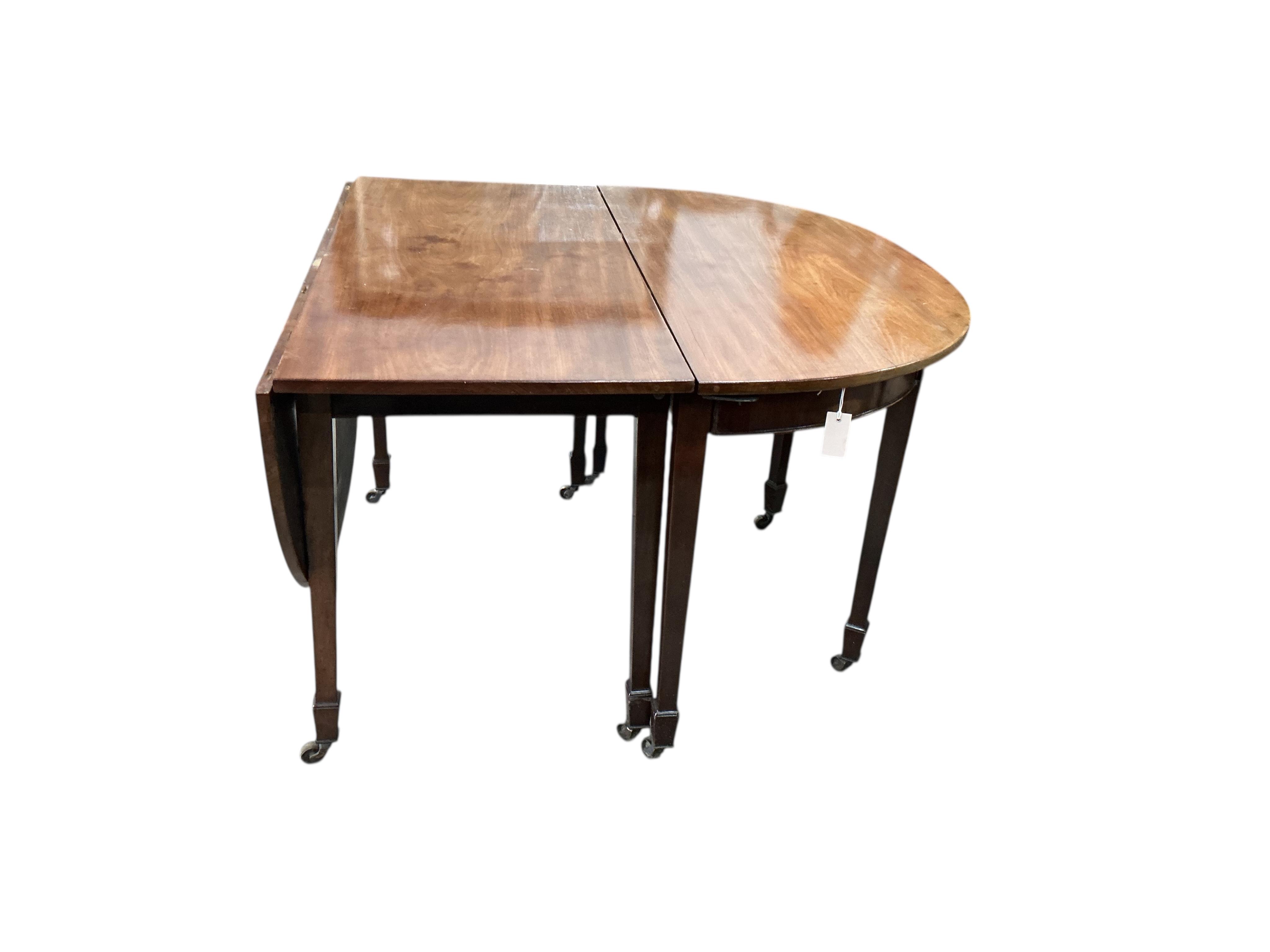 A George III and later mahogany D end extending dining table, width 217cm extended, one spare leaf, depth 122cm, height 76cm